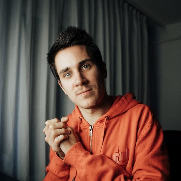 Portrait of Orion Vega, group coordinator and fusion cooking expert